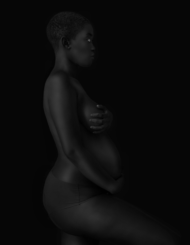 Black woman in barely discernible shadow holding her pregnant belly