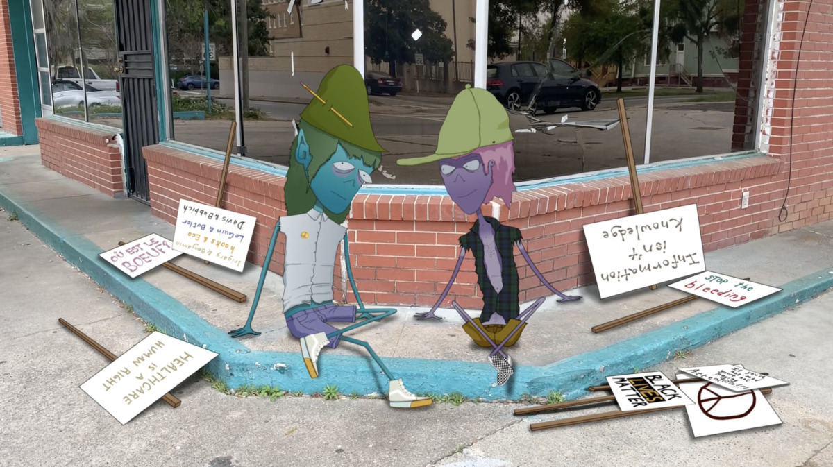 two animated humanoid figures sit at a street corner with protest signs on the ground.