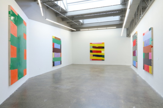 installation view of paintings
